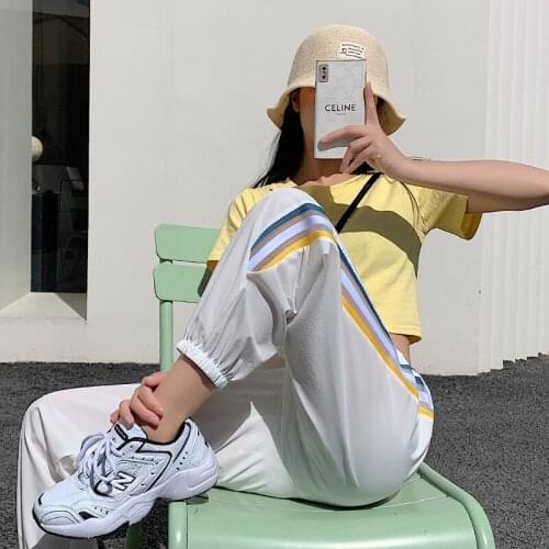 Summer quick-drying sports womens pants are loose, white pants are breathable, thin and casual Harlan feet pants