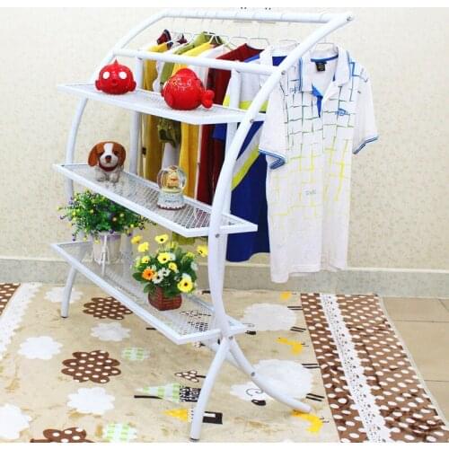 Clothing exhibition shelf. Console clothing display frame. Hanger