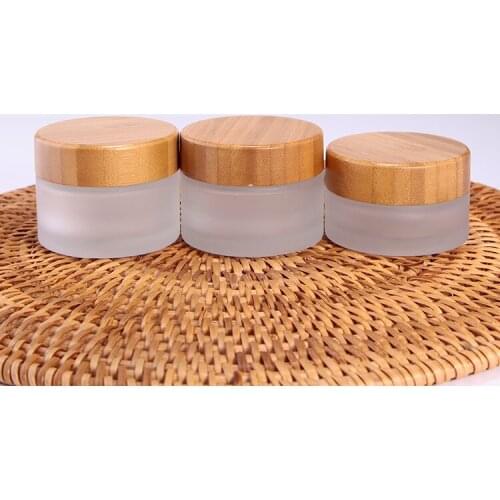 100pcs 5g 15g 30g 50g 100g Recycled Frosted Glass Jars With Bamboo Lids bamboo cosmetic jar glass for face cream packing