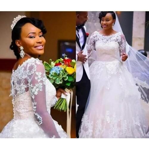 Saudi Arabia Plus Size Wedding Dresses Bridal Gowns Illusion Long Sleeves Scoop Sheer wedding gown Covered Button Lace Puffy