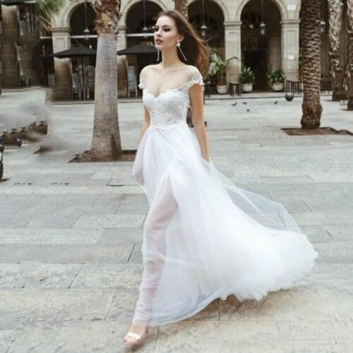 2021 New Delicate Lace Boho Bridal Wedding Dresses Short Sleeves Illusion Jewel Neck Wedding Gowns for Bride Open Back On Sale