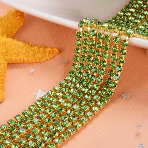 5yard/piece Light green Crystal Glass Rhinestones chain Gold bottom DIY Wedding dress and Mobile phone shell SIJISHUIZUAN