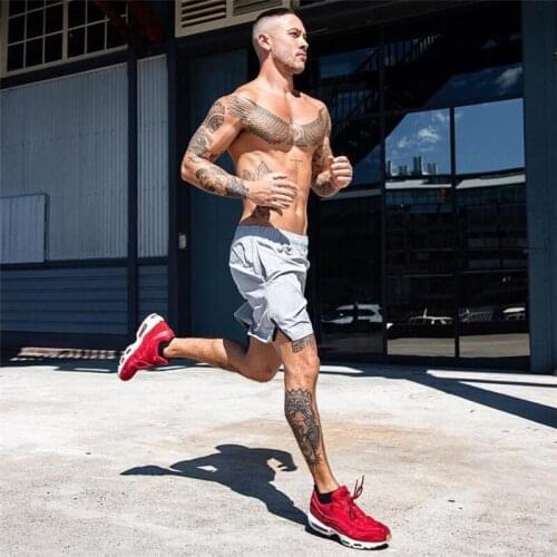 Summer mens casual running sports slim shorts gym fitness polyester quick-drying beach surfing trend shorts men