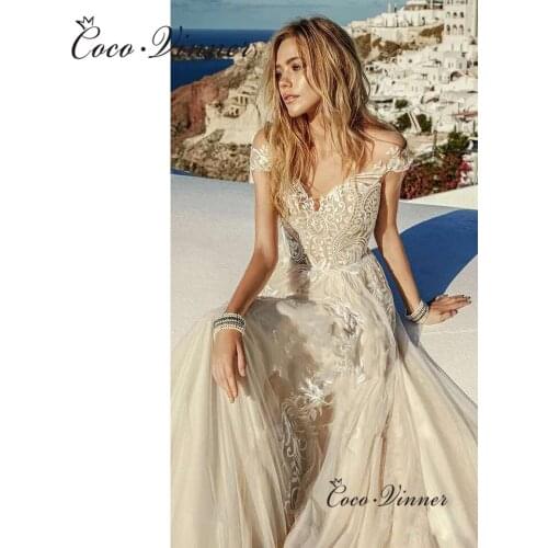 Cap Sleeves Delicate Embroidered Lace on Net Illusion Tulle Beach Wedding Dresses Button Vestido Novia Negro Champagne W0619