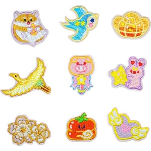 100pcs/lot Embroidery Patch Golden Bird Piggy Pumpkin Rabbit Flower Heart Wing Clothing Decoration Iron Heat Transfer Applique