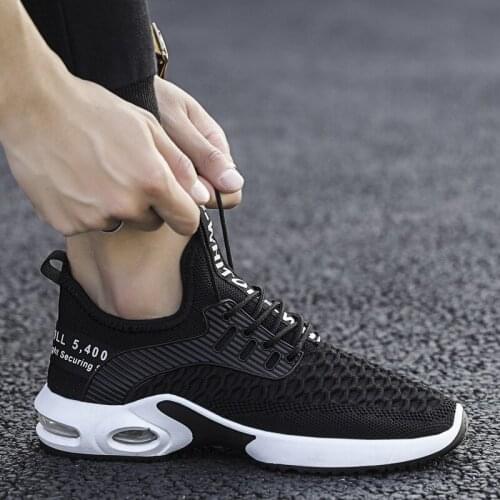 Mens casual shoes flying woven breathable air cushion sneakers mens low-top trend wild casual non-slip mens shoes