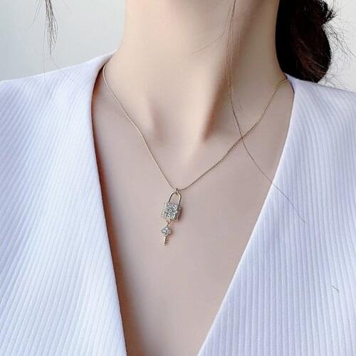 U-Magical Exquisite Glitter Flower Key Lock Rhinestone Pendant Necklace for Women Charming Gold Color Hollow Necklace Jewelry