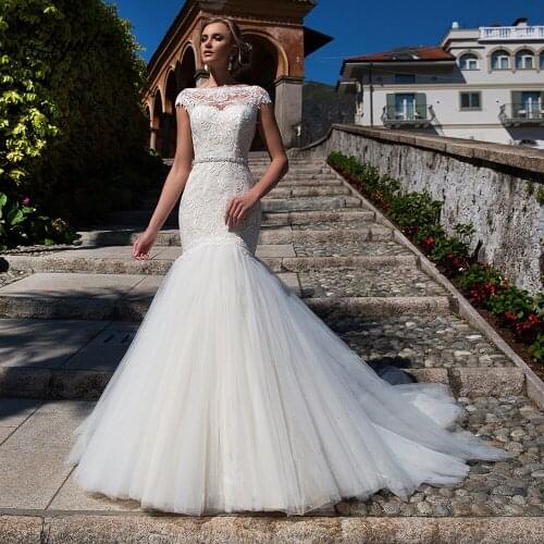 Liyuke Gorgeous Symmetrical Lace Mermaid Wedding Dress With Puffy Tulle Bridal Dress