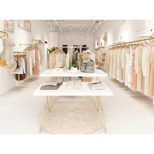 Clothing store display table in the middle of the island running water store set of solid wood rectangular high and low table