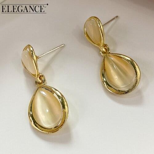 ELEGANCE11 Golden Water Drop Earrings Korean Pendant Transparent Crystal Material Bright Gold Metal Ladies Night Shiny Jewelry
