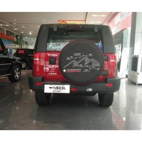 General purpose spare tire storage box and spare tire bag for Volvo