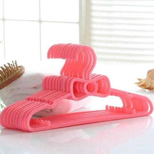 Hot Sales In Stock 10pcs Set Childrens Bow Hanger Home Baby Clothes Hanger Plastic Portable Cute Clothes Hanger Household