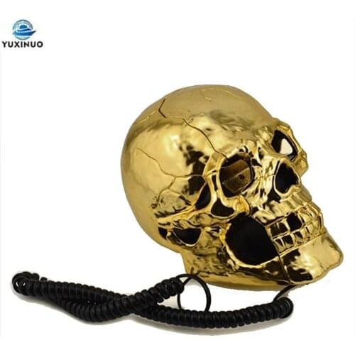 Cool Corded Phone Skull Head Ghost Telephone Golden Color, Eyes with LED Flashing Light, Audio Pulse Dialing Decoration for Home