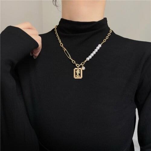 South Korea Dongdaemun senior sense of pearl pendant necklace female minority light luxury retro choker clavicle chain