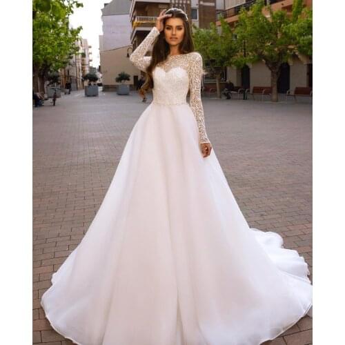 Wedding Dress A-Line O-Neck Full Sleeve Lace Appliques Sequined Beads Backless Floor Length Sweep Train Elegant Bride Gown New