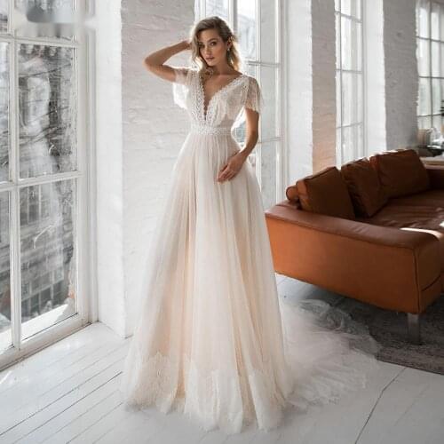 Boho Wedding Dress Cap Sleeve Lace Appliques Dot Tulle Bride Gowns V-neck Backless Beach Wedding Party Gowns Vestido De Noiva