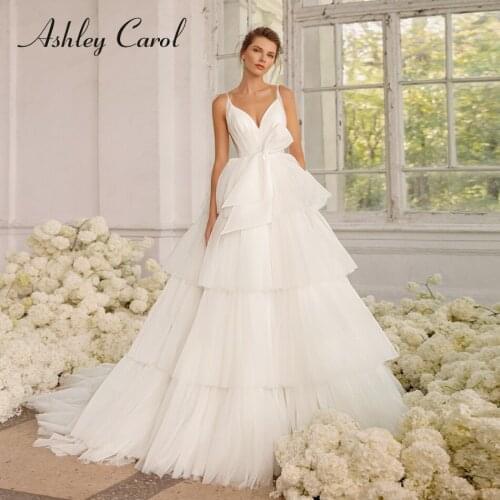 Ashley Carol A-Line Wedding Dress 2021 Classy V-Neck Spaghetti Straps Sparkling Ruffles Bride Bow Backless Princess Bridal Gowns