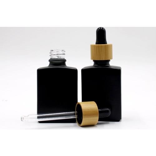 Cosmetic Packaging Essential Oil With Bamboo Lid Cap Skin Care Perfum Jar Black Frosted Glass Bottle Cosmetic Containers Bottles