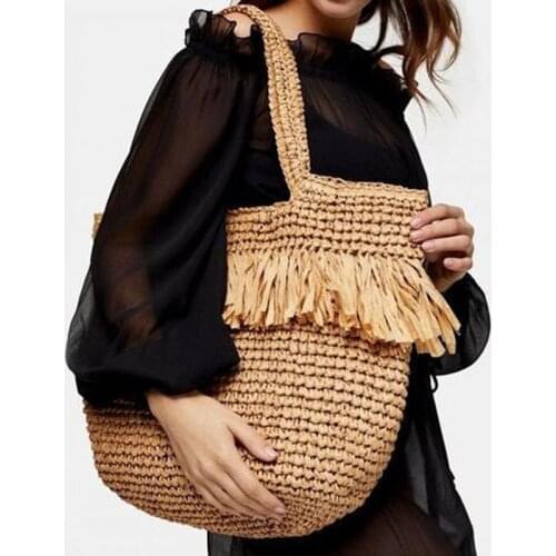 Hand-woven bag tassel fashion straw woven bag seaside vacation beach bag shoulder portable large-capacity female bag tide
