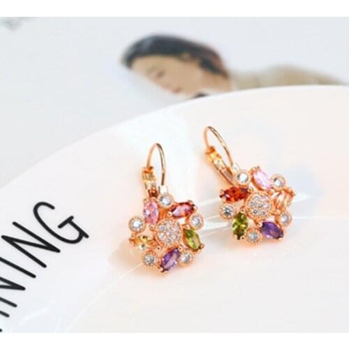 New four-petal Rhinestone coloured earrings and Earrings do not fade