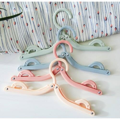 Travel clothes hanger Portable Folding Clothes Hanger Multifunction Magic Stretch Drying Rack Home Wardrobe Storage Rack
