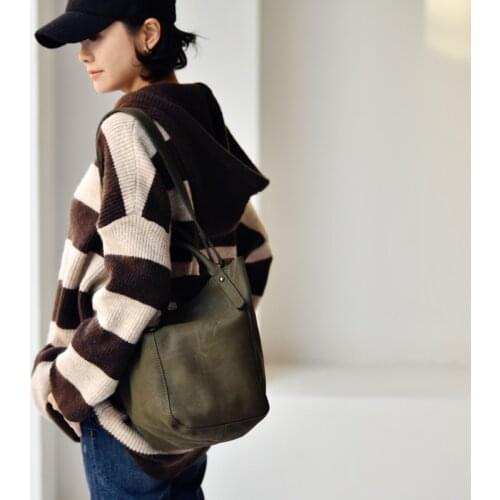 MICOCO D2681 Commuter fashion large capacity cowhide hand carrying bucket bag with one shoulder slung bag for ladies