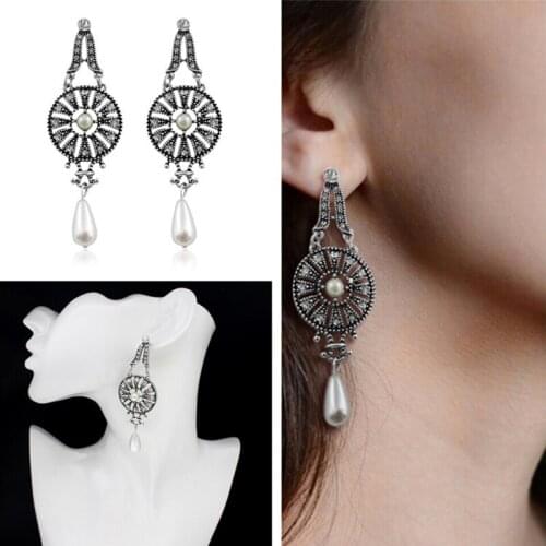 Retro silver plated Setting Rhinestone bead Round hollow Hanging drop-shaped imitation pearl Pendant earrings Fashion personalit