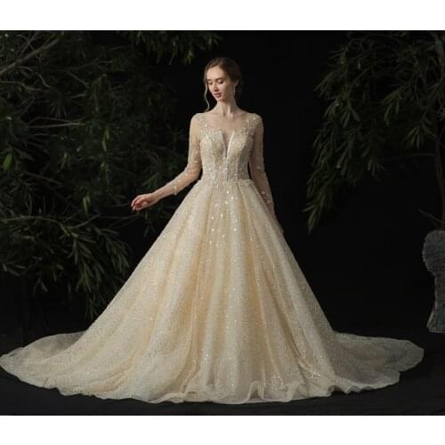 Champagne Sparkle Lace O-Neck Long Sleeve Cathedral Train Backless Ball Gown Wedding Dress