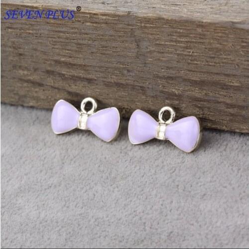 High Quality 10 Pieces/Lot 10mm*20mm Pink Enamel Cute Bow Metal Charms