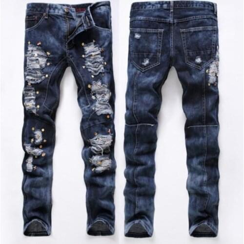 Cheap splice beggar jeans men biker jeans men trousers Badge nailing male denim pants masculino motorcycle fashion designer