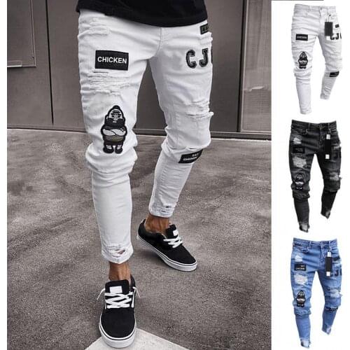 Wholesale Stylish Men Badge Ripped Hole Pockets Skinny Jeans Stretchy Tights Denim Pants