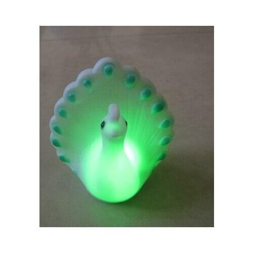 Peacock colorful led transform The New Peacock Colorful Led Small Light Automatically Transform Movie & Tv Toy Plastic