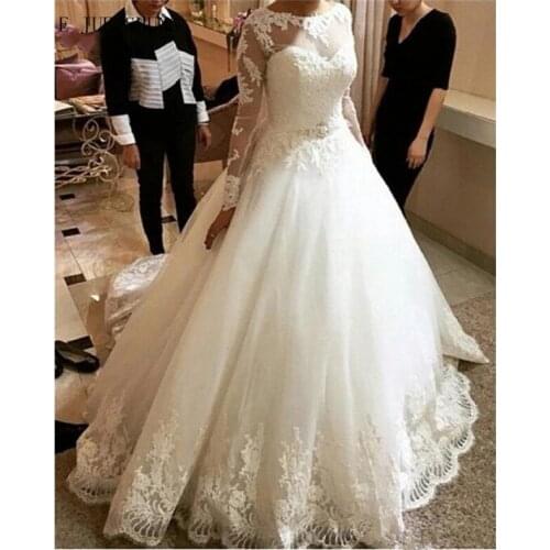 E JUE SHUNG Luxury Full Applique Wedding Dresses Sheer Crew Neck Long Sleeves Crystal Sash Ball Gown Bridal Gowns abiti da sposa