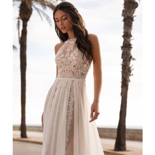 Floor Length Lace Appliques Sweep Train Long Sleeve V-Neck Wedding Dress Backless Backless Bridal Gowns Stunning High Quality