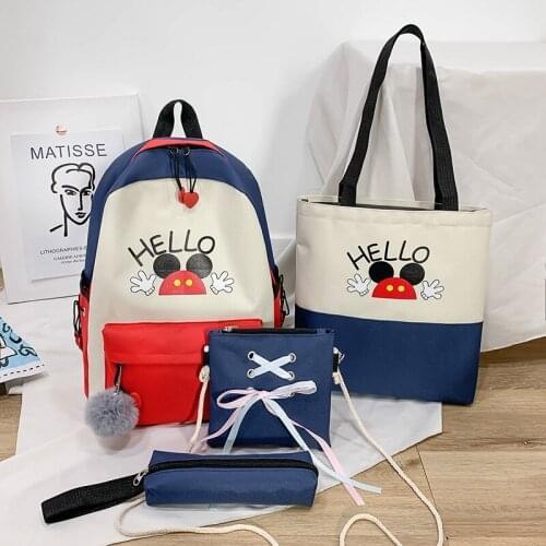 Four-piece canvas backpack pen bag messenger bag Korean version of the new female cartoon cute campus backpack