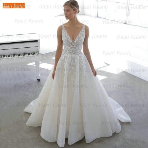 V Neck Wedding Dresses 2020 Vestido De Noiva Lace Appliqued Ball Gown Bride Dress For Women Backless Custom Made Abiti Da Sposa