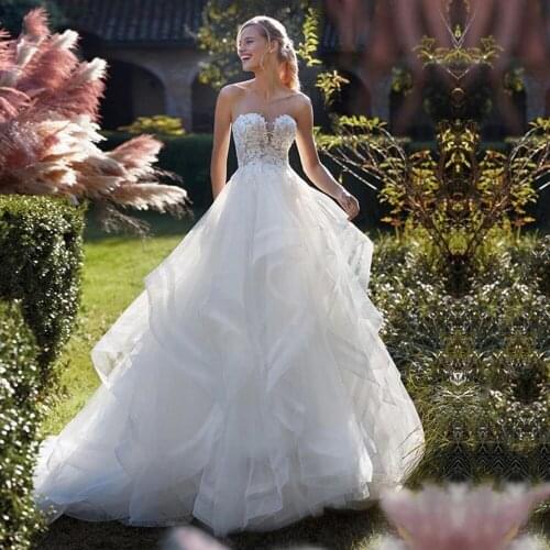 WUZHIYI Strapless Boho Wedding Dresses Appliques Beaded Ball Gown Sleeveless White Bridal Dress Ruffles Tiered Robe De Mariee