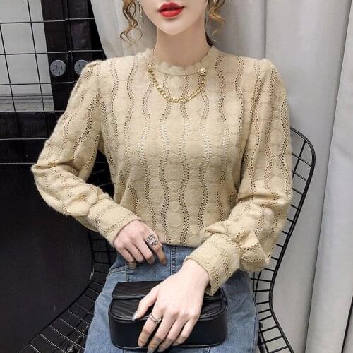 Long-sleeved lace shirt women 2021 new autumn temperament super fairy hollow top bottoming t shirt solid