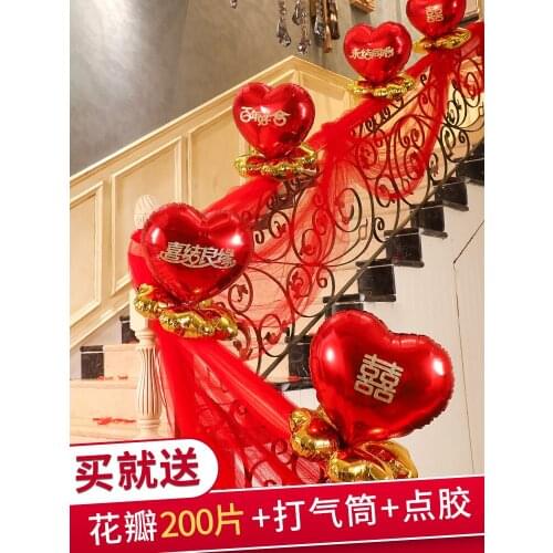 Decorated wedding room layout staircase balloon handrail
