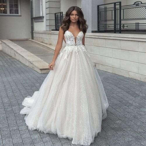 Luxury Cap Sleeves A Line Wedding Dresses O Neck Sheer Top Lace Appliques Open Back Sweep Train Vestido De Noiva Bridal Gowns