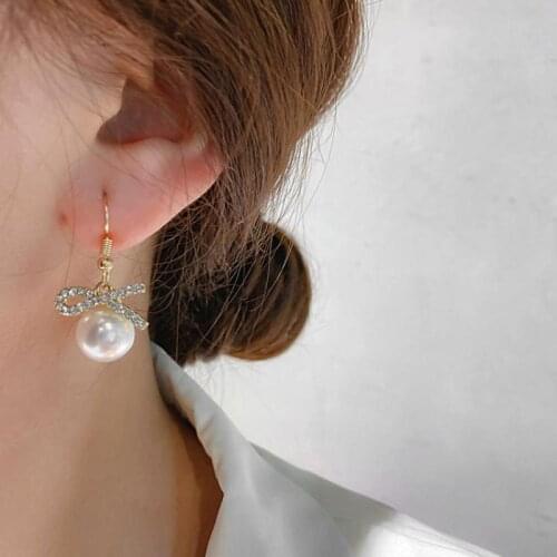Sweet Girl Earrings 2021 Fashion New Temperament Earrings Dongdaemun Crystal Bow Pearl Net Red Earrings Wholesale Oorbellen
