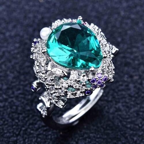 Design model of water droplets pear-shaped imitation natural paraiba powder crystal canary ring