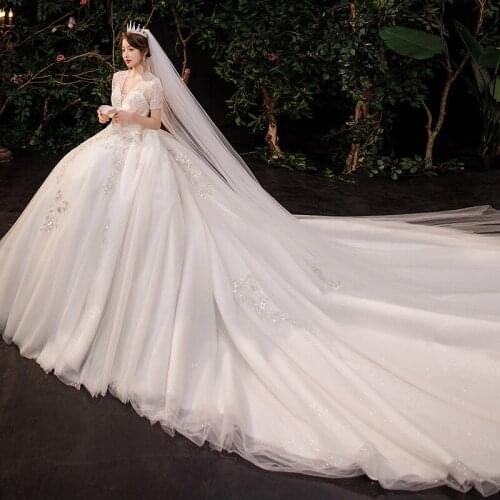 Luxury Handmade Custom Made Wedding Dress 2021 New With Sweep Train Sexy V Neck Bridal Ball Gown Lace Beading Short Sleeve Dress