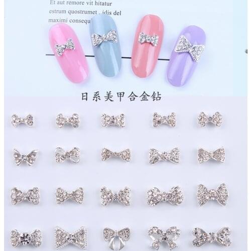 100pcs K9 Nail Art Rhinestones 6*13mm Designs Crystal ab Rhinestones Alloy Gold 3d Nail Charms Bows Silver Pearls Jewel Decals
