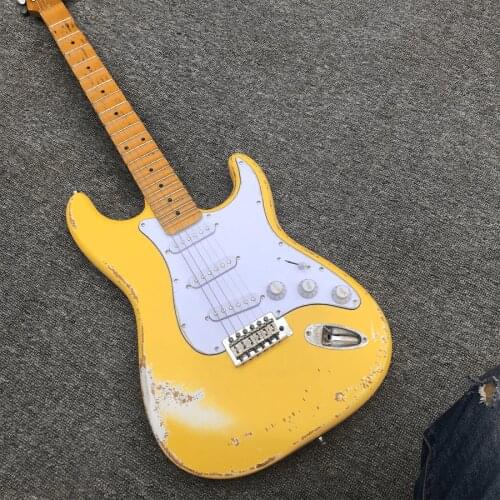 Custom made, used electric guitar, red poplar xylophone body, grooved fingerboard, brass string pillow. Wholesale and retail