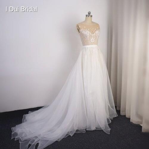 Cap Sleeve Sparkle Wedding Dress with Organza Ruffles Illusion Neckline Shinny Bridal Gown