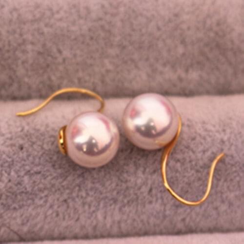Charming pair of 10-11mm south sea round white pearl earring 18k