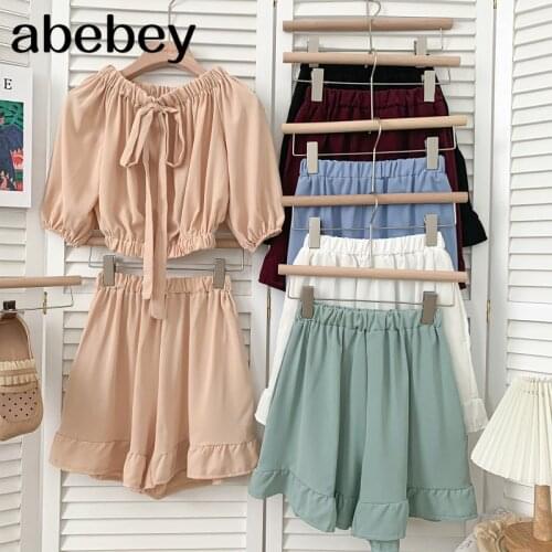 Fashion versatile lace up bow off shoulder Shirt Top + Elastic waist Ruffles Shorts two piece set 2021 New Summer Women