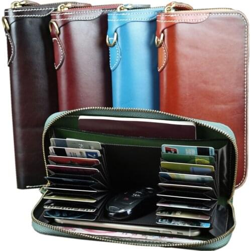 2020 new Unisex top layer cowhide Multi-card position wallet Vegetable tanned leather mobile phone passport bag
