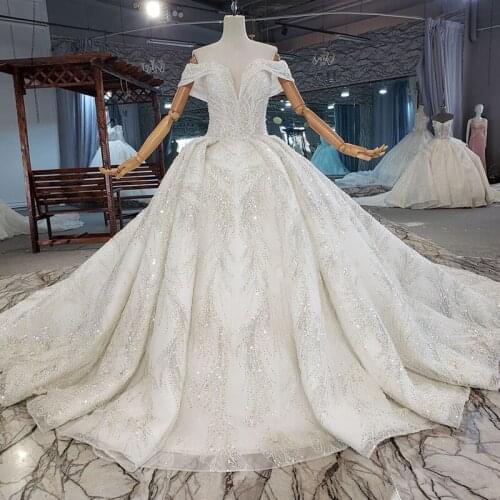 Charming Champange Wedding Dress Shiny Flowers Crystals Trailing Robe V-neck Lace Sexy Backless Bridal Gowns